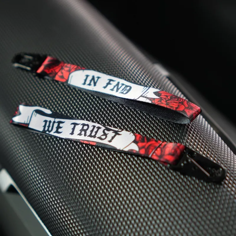 Flip N Dip key tags on a motorcycle seat